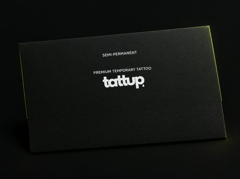 Tattup pack: black envelope with the Tattup logo and the print Premium Temporary Tattoo